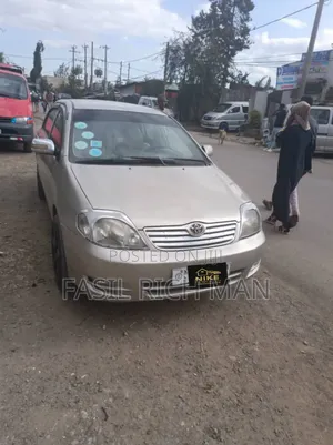 Photo - Toyota Corolla 2003 Gold
