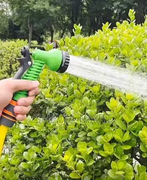 Photo - Lexplandable Garden Hose With Flunction Spray Nozzle Set Watering