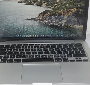 Photo - New Apple MacBook Air 2025 M4 13-Inch 8GB Intel Core I5 SSD 256GB