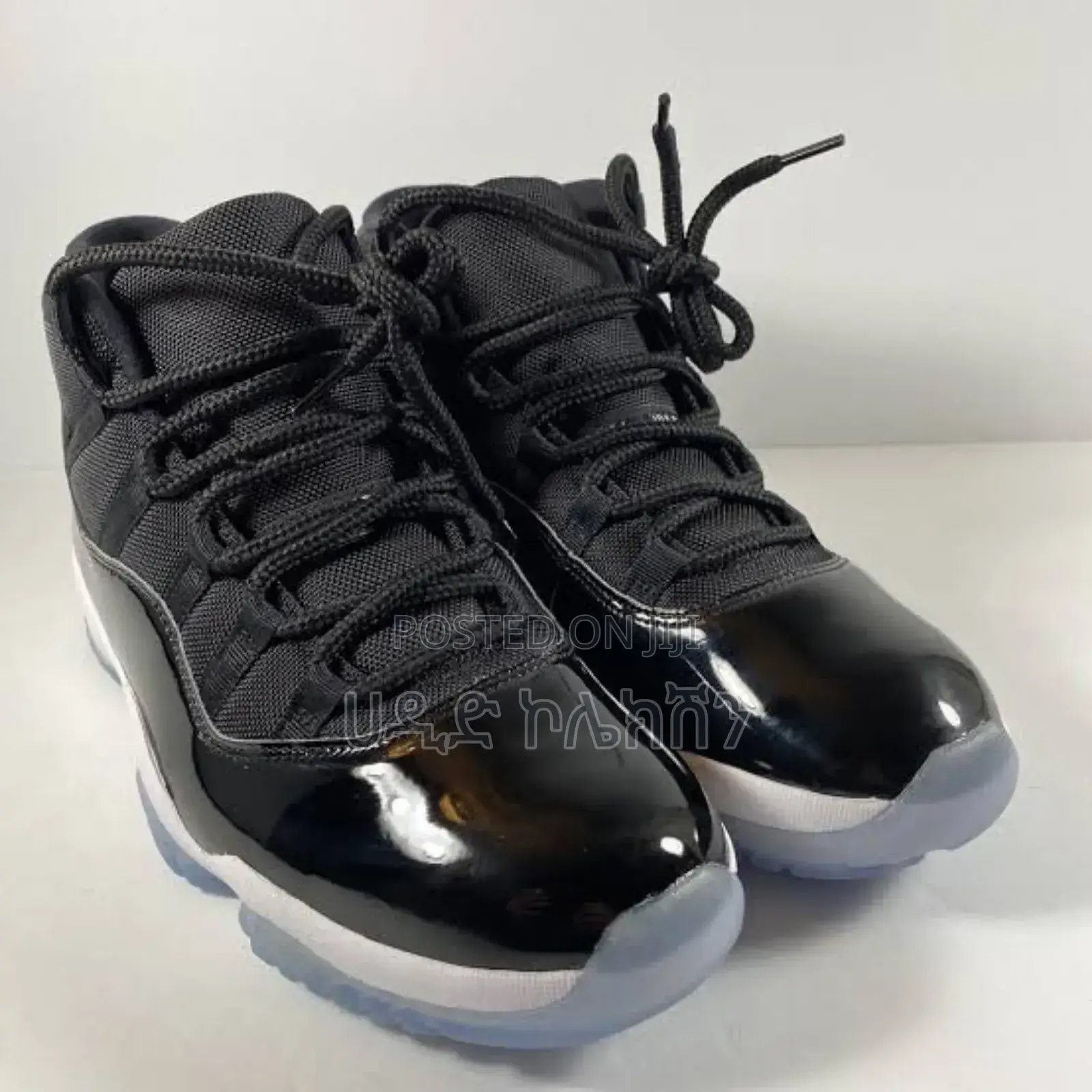 Air Jordan 11 Retro "Cap and Gown" Sneakers