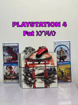 Photo - Playstation 4 Fat and Cd Game