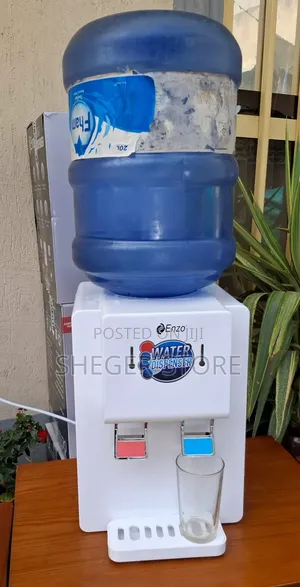 Top Enzo 2 in 1 Water Dispenser (ሁለት ጥቅም የሚሰጥ 
 ውሃ ያጣራል እንደዚሁም ያሞቃል)