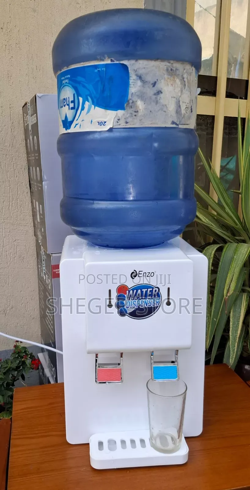 Top Enzo 2 in 1 Water Dispenser (ሁለት ጥቅም የሚሰጥ 
 ውሃ ያጣራል እንደዚሁም ያሞቃል)
