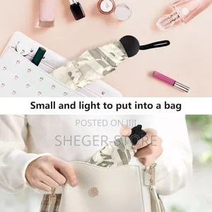 Mini Uv Resistant Pocket Umbrella (አውቶማቲክ፣ ጎጂ የፀሃይ ጨረርን የሚከላከል)