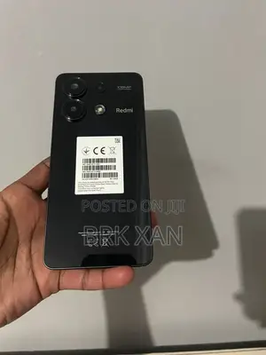 Photo - New Xiaomi 13 128 GB Red