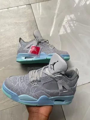 Photo - Air Jordan 4 X Kaws Shoes