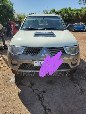 Photo - Mitsubishi L200 2010 White