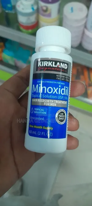 Photo - Kirkland Minoxidil 5% Hair Growth Solution - 60ml