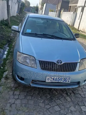 Photo - Toyota Corolla 1.4 C 2005 Burgundy