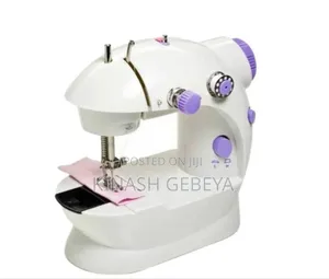 Photo - High Quality Mini Cloth Sewing Machine