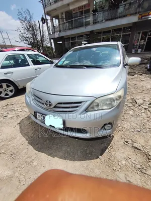 Photo - Toyota Corolla L 4dr Sedan (1.8L 4cyl 5M) 2013 Silver