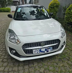 Photo - Suzuki Swift 2022 White