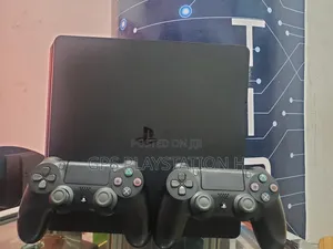 Photo - Playstation 4 Slim With Games You Will Buy
