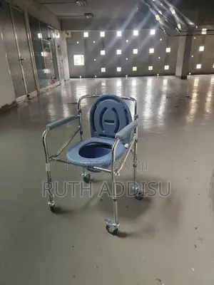 Photo - Four Wheel Medical Commode Chair Adjustable Height Commode Chair