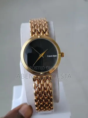 Photo - Calvin Klein Women's Watch With a Gold- Toned Stainless Steel Link