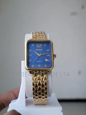 Rado Quartz Watch With a Gold-Toned Rectangular Case, a Blue