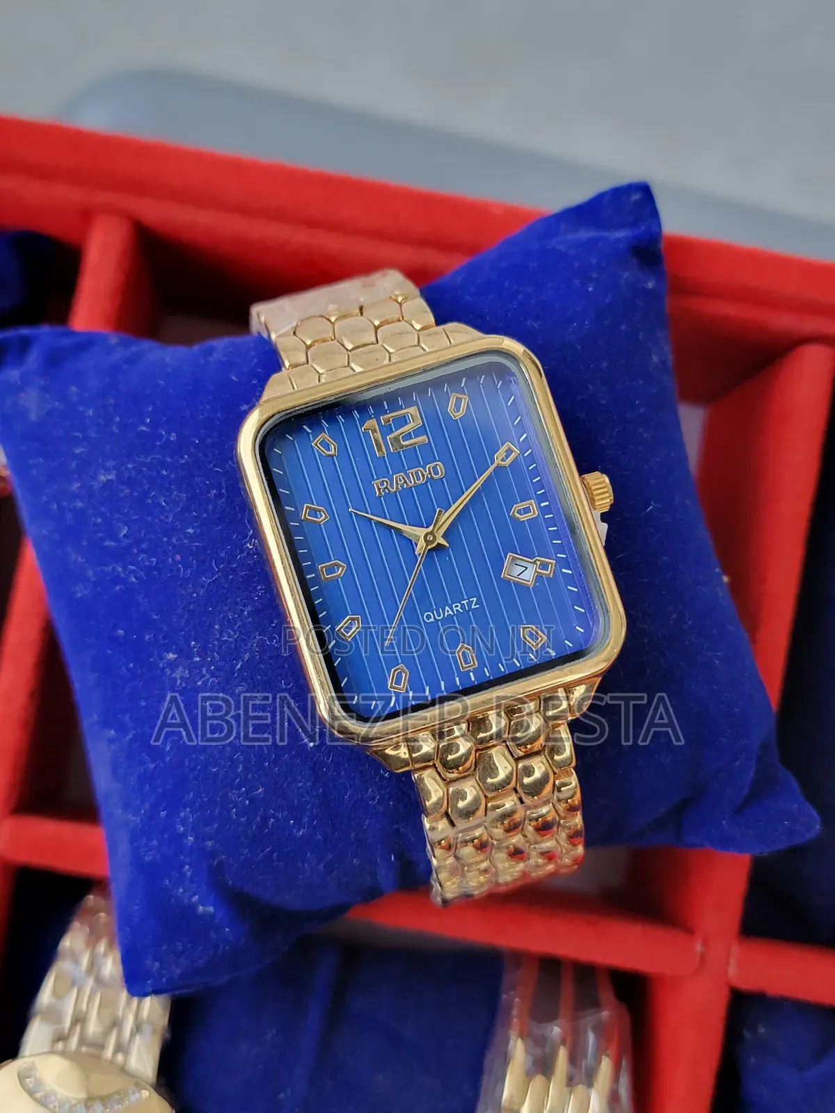 Rado Quartz Watch With a Gold-Toned Rectangular Case, a Blue