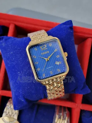 Rado Quartz Watch With a Gold-Toned Rectangular Case, a Blue