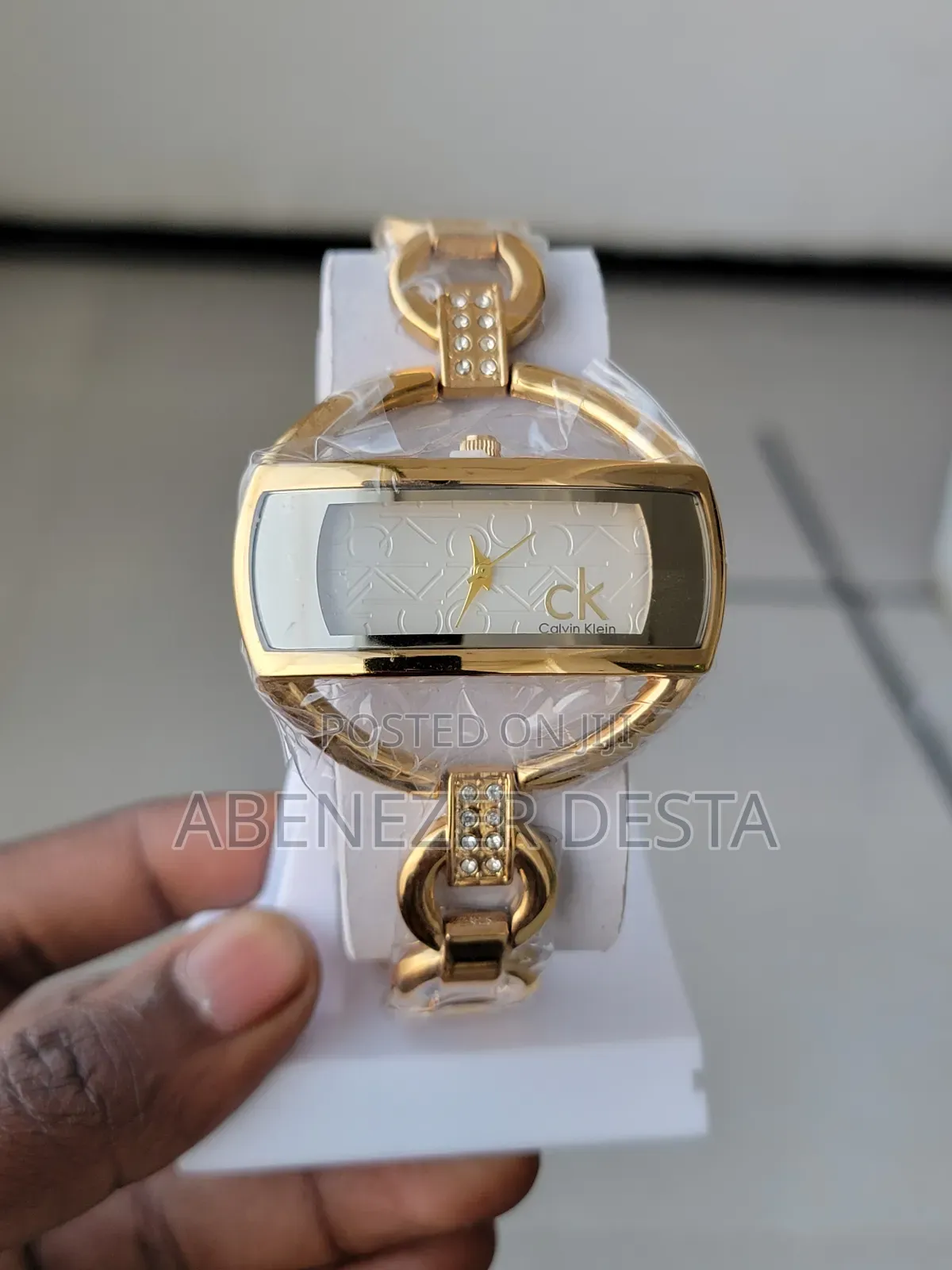 Ladies Watch Gold-Tone Calvin Klein Watch With a Rectangular Face