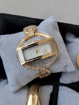 Ladies Watch Gold-Tone Calvin Klein Watch With a Rectangular Face