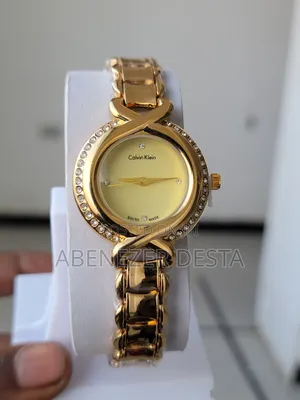 Photo - Calvin Klein Twisted Bezel Oval Ladies Quartz Watch With a Gold-Plated