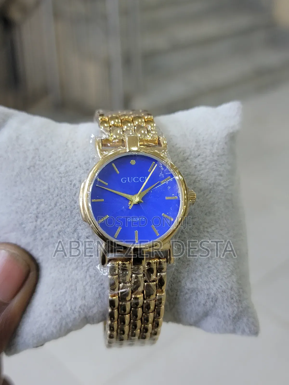 Vintage Gucci Gold-Plated Quartz Watch With a Blue Dial.