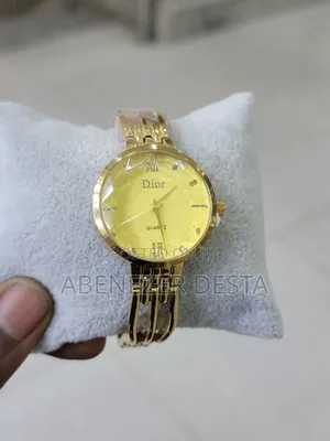 Christian Dior Quartz Watch With a Gold- Toned Bracelet Yellow Face