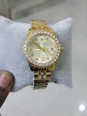 Rolex Oyster Perpetual Datejust With a Gold-Toned Bracelet,
