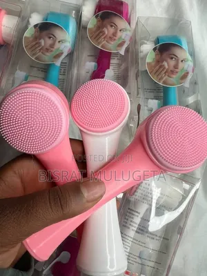 Photo - -sided Facial Cleansing Brush.