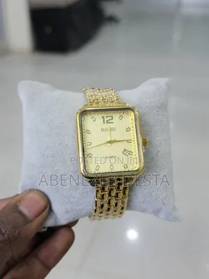 Photo - Gold-Tone Rado Quartz Watch With a Square Face and a Honeycomb-Pattern