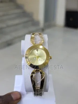 Photo - Calvin Klein Sculptural Bracelet Watch in Gold-Plated Steel