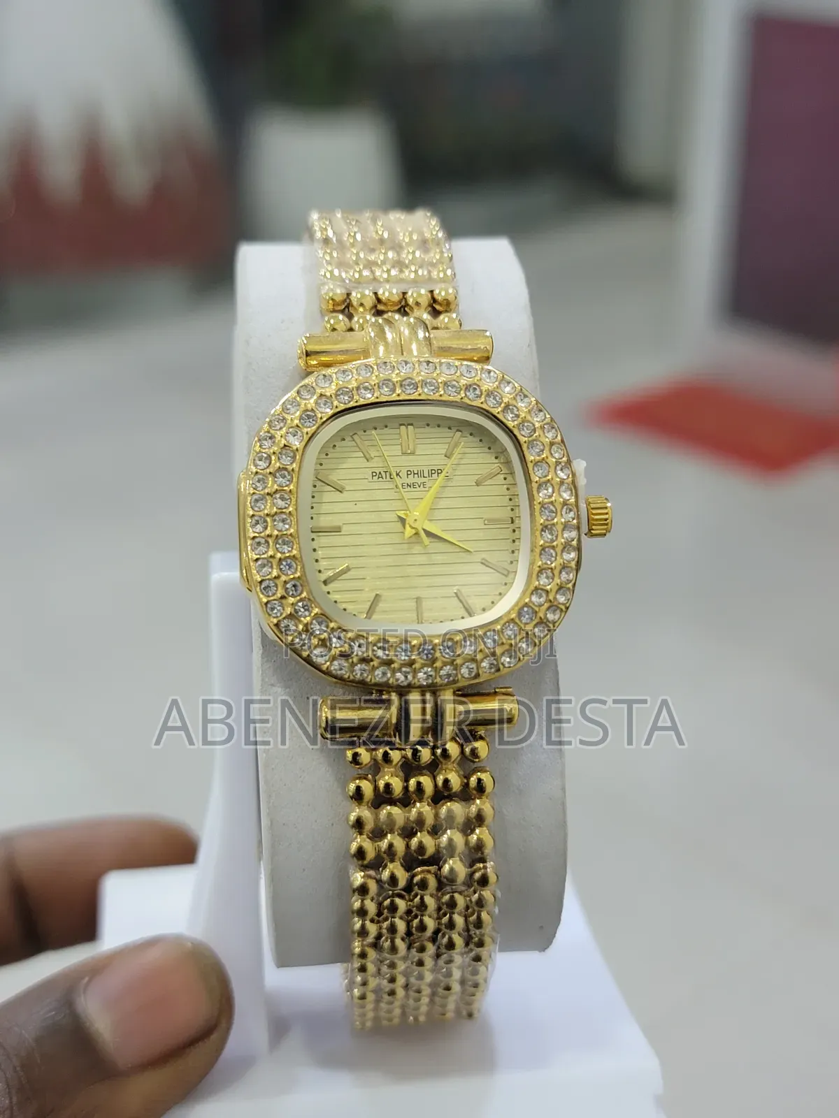 Gold-Toned, Diamond-Encrusted Patek Philippe Watch With a Square