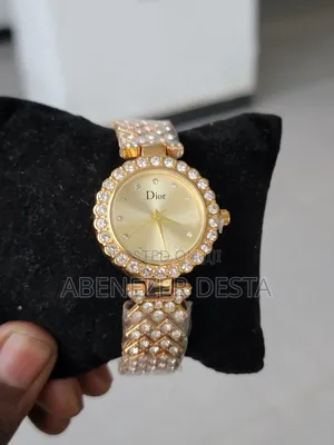 Fancy Stone Ladies' Watch With a Fancy Stone Cuff Bracelet.