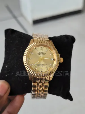 Photo - Rolex Oyster Perpetual Datejust With a Gold