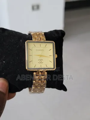 Chanel Watch With a Gold-Tone Square Face and a Link Bracelet.