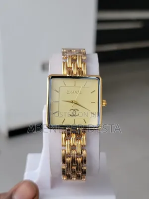 Chanel Watch With a Gold-Tone Square Face and a Link Bracelet.