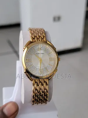 Photo - Gold-Colored Calvin Klein Women's Watch With a Metal