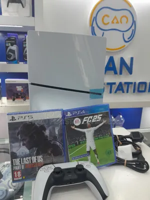 Photo - Playstation 5 and Cd Games