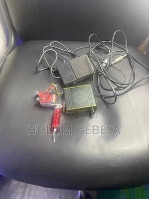 Photo - Tattoo Coil Machine (የንቅሳት ዘመናዊ ማሽን) ከ ቀለምና መርፌ ጋር