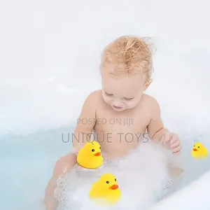 2-in-1 Floating Squeaking Bath Ducks With Net Set – 10 PCS
