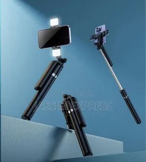 Photo - ቁመቱ እስከ 1.7 Meter መርዘም የሚቺል Selfi Stick Tripod With Light
