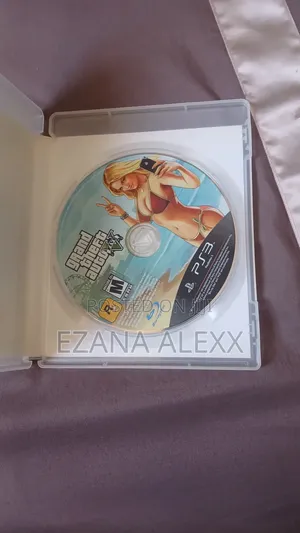 Photo - Ps 3 Cd Game Gta 5 Mortal Combat