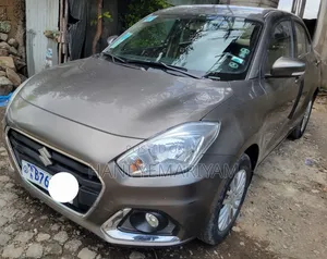 Photo - Suzuki Dzire 2021 Brown