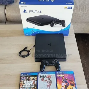 Photo - Playstation 4 Slim ከ 1cd Gift ጋር