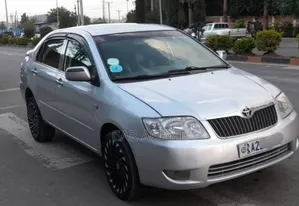 Photo - Toyota Corolla 2002 White