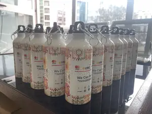 Photo - Water Bottle and Agenda