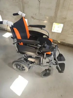 Photo - Electrical Wheelchair Packed Wheelchair