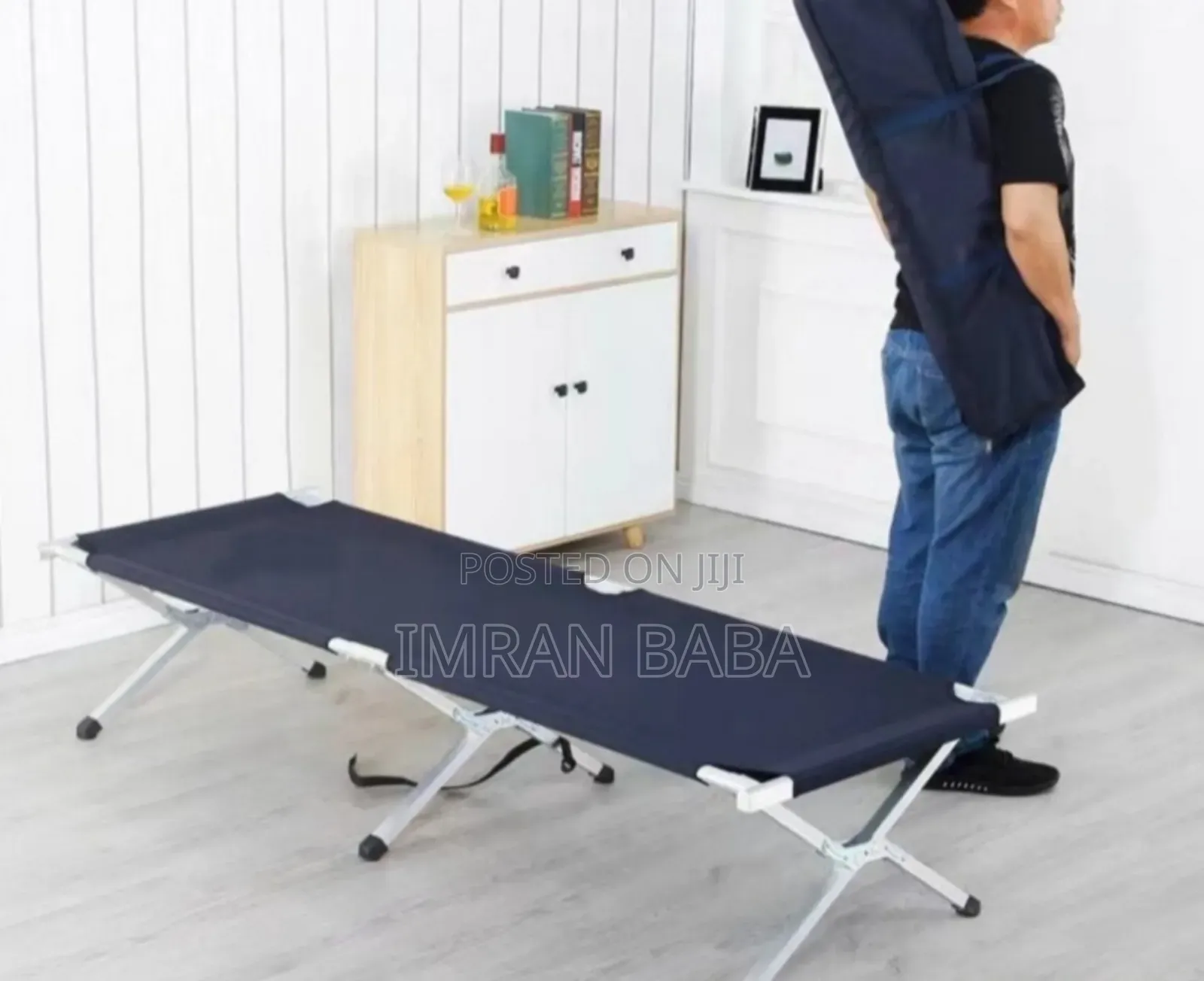 ተጣጣፊ የጉዞ አልጋ