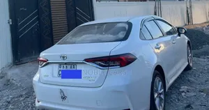 Photo - Toyota Corolla 2023 Ivory