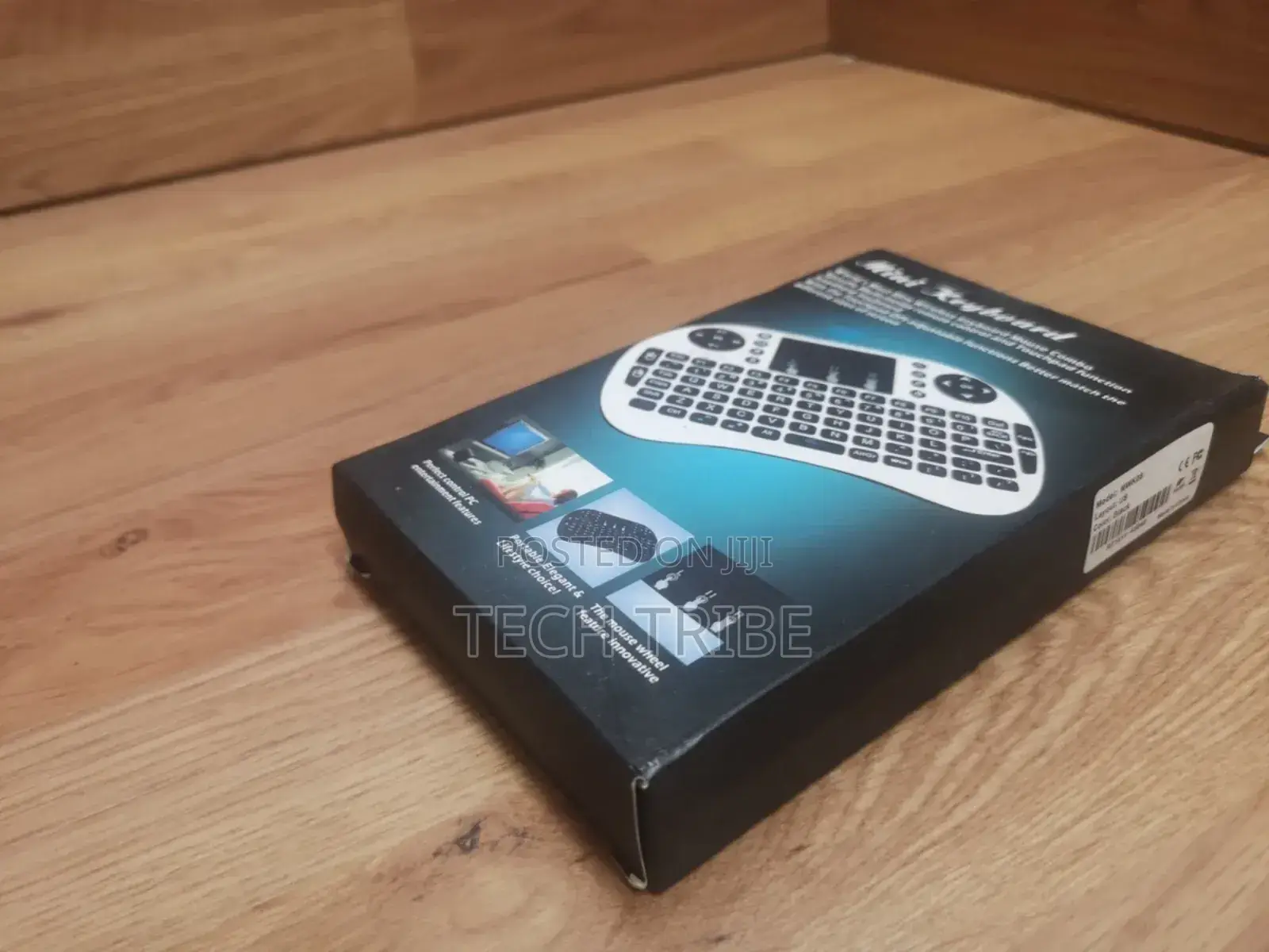 Mini Wireless Keyboard With a Touch Pad Lightweight Handheld Design